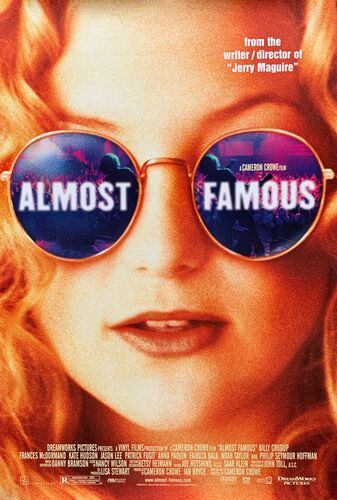Filmcover van "Almost Famous" met een vrouw in grote zonnebrillen en de filmnaam prominent weergegeven.